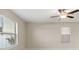 Bright bedroom with window blinds and ceiling fan at 578 Argyll Dr, Spring Hill, FL 34609