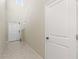 Bright entryway with staircase and door at 578 Argyll Dr, Spring Hill, FL 34609