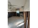 Unfinished bedroom with tiled floor and ceiling fan at 6116 Island Dr, Weeki Wachee, FL 34607