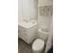 Clean bathroom with toilet and vanity at 6801 Dali Ave # G104, Land O Lakes, FL 34637
