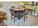 Dining area with a table and four chairs at 6801 Dali Ave # G104, Land O Lakes, FL 34637