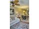 Living room with sofa and view into dining area at 6801 Dali Ave # G104, Land O Lakes, FL 34637