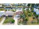 Property's aerial view showing canal access and neighborhood at 7304 Sheepshead Dr, Hudson, FL 34667