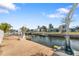 Boat lift and dock with canal view at 7304 Sheepshead Dr, Hudson, FL 34667