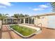 Rectangular pool with surrounding patio at 7304 Sheepshead Dr, Hudson, FL 34667