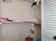 Linen closet with shelving for storage at 7384 Prince George Ct, Spring Hill, FL 34606