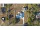 Aerial view of house, barn, and surrounding property at 9331 Elida Rd, Spring Hill, FL 34608