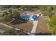 Aerial view of home, barn, and expansive lot at 9331 Elida Rd, Spring Hill, FL 34608