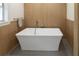 Modern bathroom with freestanding soaking tub at 9331 Elida Rd, Spring Hill, FL 34608