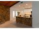 Modern kitchen with granite countertop and stone breakfast bar at 9331 Elida Rd, Spring Hill, FL 34608