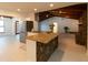 Updated kitchen featuring granite island and stainless steel appliances at 9331 Elida Rd, Spring Hill, FL 34608