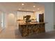 Modern kitchen with granite countertop and stone breakfast bar at 9331 Elida Rd, Spring Hill, FL 34608