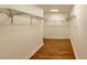 Large walk-in closet with shelving and rods at 9331 Elida Rd, Spring Hill, FL 34608