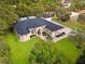 Bird's-eye view of a house, pool, and large backyard at 10331 Fox Sparrow Ave, Weeki Wachee, FL 34613