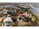 Aerial view of a luxurious home in a waterfront community at 1137 Marina Dr, Tarpon Springs, FL 34689