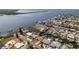 Aerial view of waterfront homes along canals, emphasizing the community's aquatic lifestyle at 13531 Allyn Dr, Hudson, FL 34667