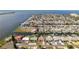 Waterfront community with houses along canals, showcasing waterfront living and boating opportunities at 13531 Allyn Dr, Hudson, FL 34667
