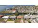 Aerial of the waterfront neighborhood showcasing canal access, nearby amenities, and coastal charm at 13531 Allyn Dr, Hudson, FL 34667