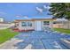 Cozy backyard offers a patio area, perfect for relaxation with outdoor seating and garden decor at 13531 Allyn Dr, Hudson, FL 34667
