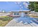 Charming backyard with patio offers an ideal outdoor living space with a cozy seating area at 13531 Allyn Dr, Hudson, FL 34667