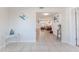 Open-concept home featuring tile floors and an inviting living room area at 13531 Allyn Dr, Hudson, FL 34667