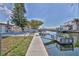 Backyard waterway offers boat access to waterfront homes with a private dock and canal views at 13531 Allyn Dr, Hudson, FL 34667