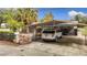 A well-kept home featuring a convenient carport with ample parking space at 14034 Water Tower Dr, Hudson, FL 34667