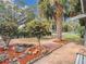 Landscaped front yard with pavers at 14034 Water Tower Dr, Hudson, FL 34667