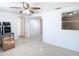 View of the sunroom with a ceiling fan and exterior views at 14034 Water Tower Dr, Hudson, FL 34667
