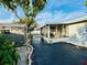 Backyard with screened patio and shed at 1415 Weyford Ln, Holiday, FL 34691