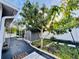 Backyard with shed and landscaping at 1415 Weyford Ln, Holiday, FL 34691