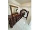 Large bedroom closet with shelving and mirror at 1415 Weyford Ln, Holiday, FL 34691
