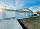 Beautiful one-story home with a large garage and freshly painted driveway at 1415 Weyford Ln, Holiday, FL 34691