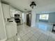 Updated kitchen features modern appliances and white cabinetry at 1415 Weyford Ln, Holiday, FL 34691