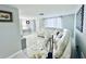 Spacious living area with a white sectional sofa and decor at 1415 Weyford Ln, Holiday, FL 34691