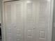 White, spacious closet with louvered doors at 1761 Cupecoy Cir # N-1, Lutz, FL 33558