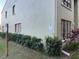 Exterior view of condo building and landscaping at 1761 Cupecoy Cir # N-1, Lutz, FL 33558
