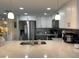 Modern kitchen with stainless steel appliances and quartz countertops at 1761 Cupecoy Cir # N-1, Lutz, FL 33558