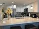 Modern kitchen with stainless steel appliances and island at 1761 Cupecoy Cir # N-1, Lutz, FL 33558