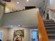 Open loft area with wall art at 1761 Cupecoy Cir # N-1, Lutz, FL 33558