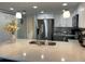 Modern kitchen with stainless steel appliances and an island at 1761 Cupecoy Cir # N-1, Lutz, FL 33558