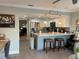 Modern kitchen with stainless steel appliances and an island at 1761 Cupecoy Cir # N-1, Lutz, FL 33558
