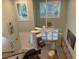 High-ceilinged living area with large windows and a view of the entryway at 1761 Cupecoy Cir # N-1, Lutz, FL 33558