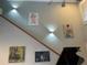 Stairwell with art and lighting at 1761 Cupecoy Cir # N-1, Lutz, FL 33558