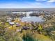 Aerial view showcasing a waterfront home and community at 18104 Spencer Rd, Odessa, FL 33556