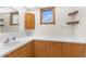 Bathroom features a vanity with sink, and a large mirror at 18104 Spencer Rd, Odessa, FL 33556
