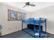 Bedroom with a bunk bed and a ceiling fan at 18104 Spencer Rd, Odessa, FL 33556