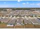 Aerial view of a neighborhood with houses and yards at 194 Argyll Dr, Spring Hill, FL 34609