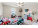 bedroom with superhero bedding and toys at 194 Argyll Dr, Spring Hill, FL 34609