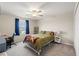 Comfortable bedroom with a queen-size bed and home office space at 194 Argyll Dr, Spring Hill, FL 34609
